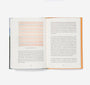 Open book with text and abstract color swatches on a white background