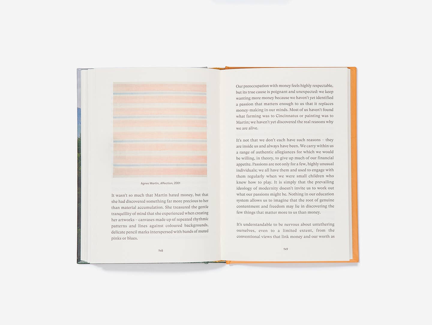 Open book with text and abstract color swatches on a white background