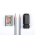 Blackwing pencils and sharpener on a white background