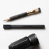 Blackwing pencils and sharpener on a white background