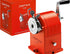 Red pencil sharpener with Caran d'Ache branding and packaging.