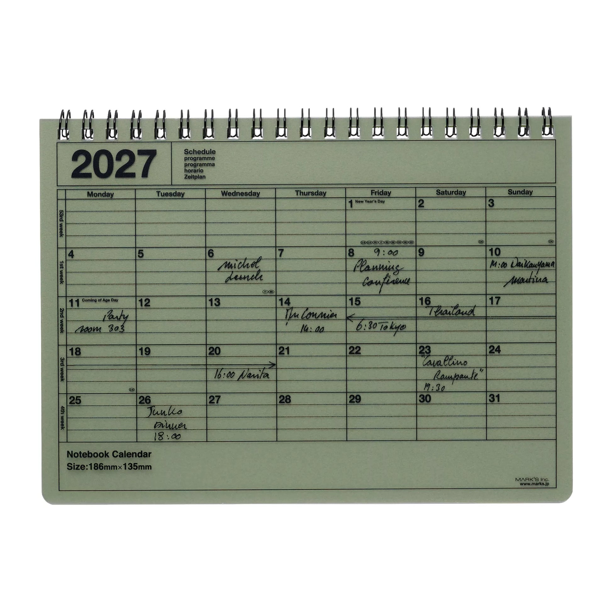 A 2027 spiral-bound notebook calendar with a light sage green cover and black printed grid layout, shown on a plain white background.