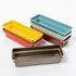Set of colorful rectangular trays on a white background