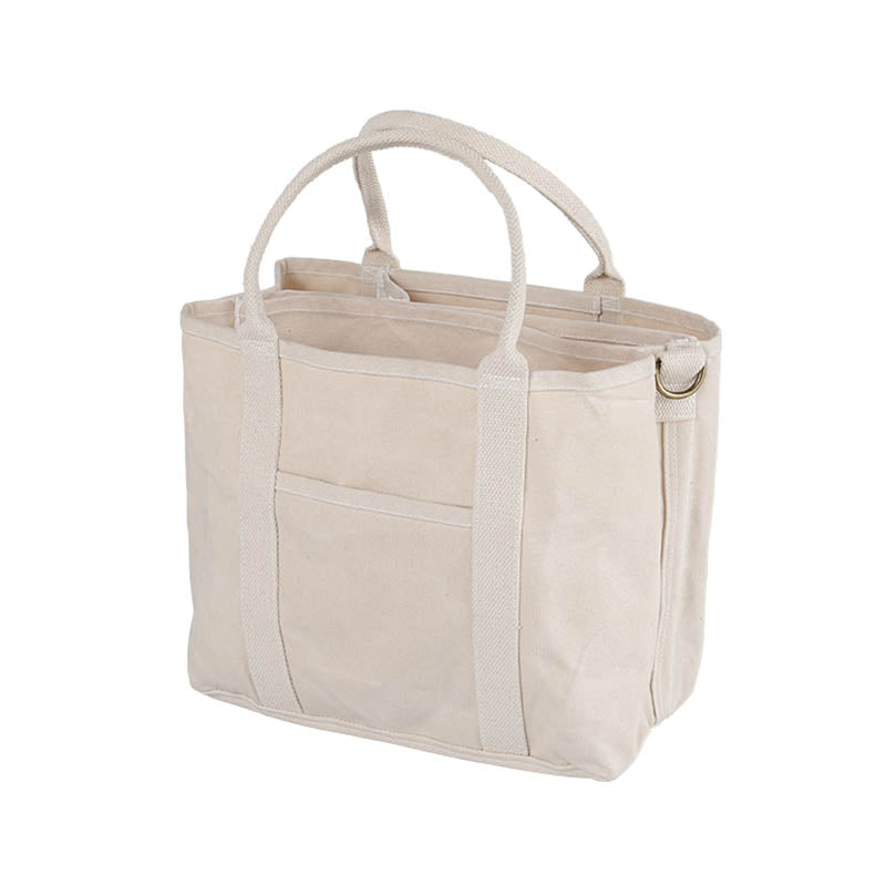 Beige tote bag with handles on a white background