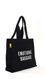 Black tote bag with 'EMOTIONAL BAGGAGE' text on a white background