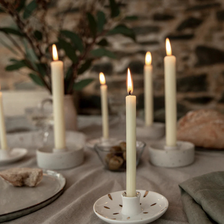 Gold Brushmarks 1/2" Candle Holder with lit candles