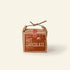 Box of Härth Hot Chocolate with cinnamon flavor on a beige background