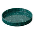Green speckled ceramic dish on a white background