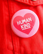 Button with 'Human Kind' text on a red background
