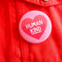 Button with 'Human Kind' text on a red background