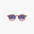 Round sunglasses with a translucent reddish-brown acetate frame and blue gradient lenses, shown against a plain white background.