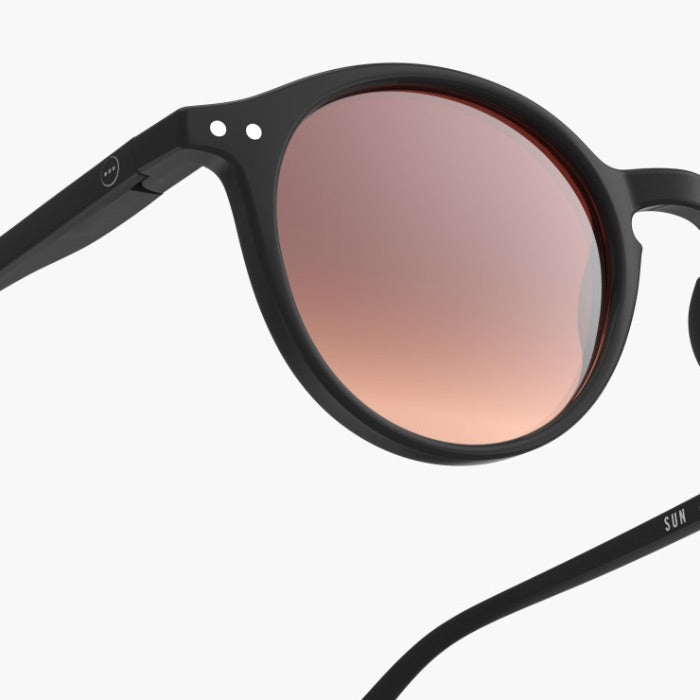 Black sunglasses with a gradient lens on a white background