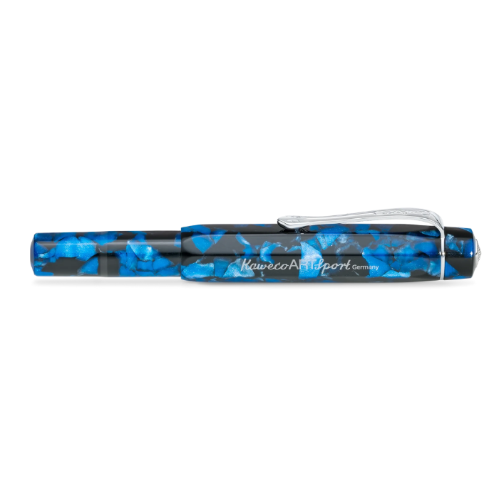 A horizontal pen with a blue and black marbled pattern, featuring a clear plastic clip and white script branding that reads Kaweco Art Sport 