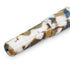 A close-up of a pen barrel with a marbled resin pattern in white, brown, tan, and blue on a clean white background.