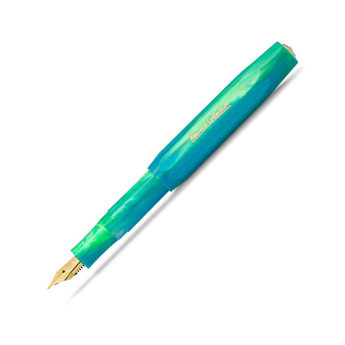 A fountain pen with a translucent green and blue gradient barrel and a gold nib, shown diagonally on a white background.