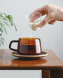 Kinto Sepia Amber Cup of coffee