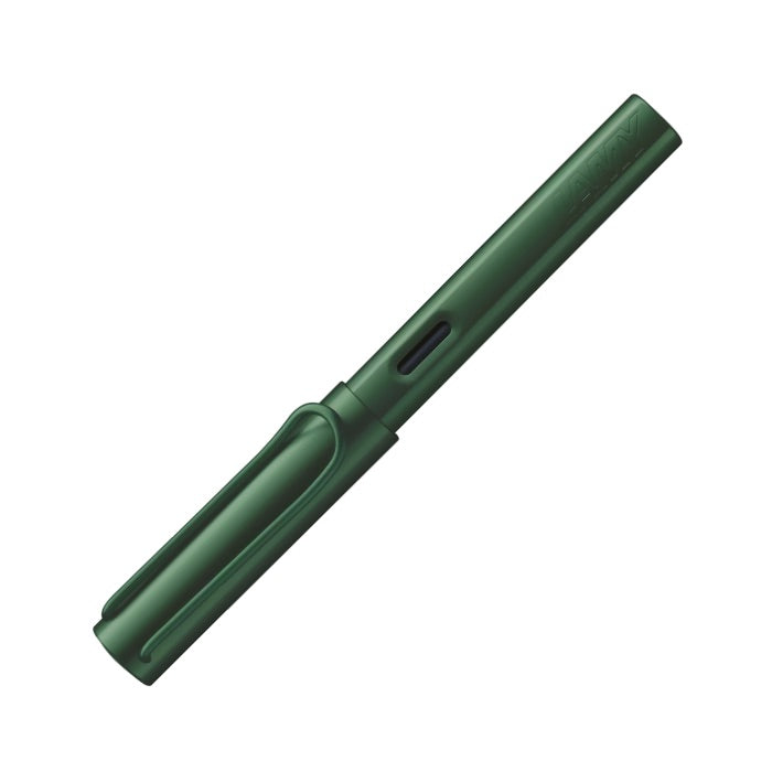 Green pen on a white background