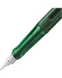 Green fountain pen on a white background