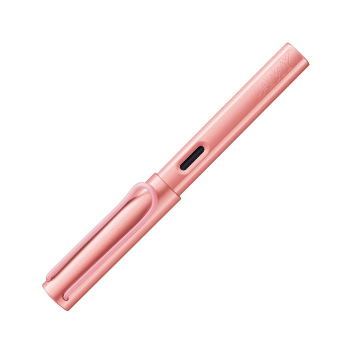 Pink pen on a white background