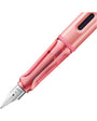 Pink fountain pen on a white background