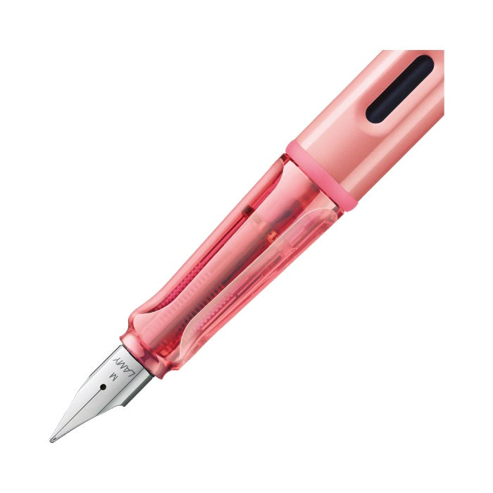 Pink fountain pen on a white background