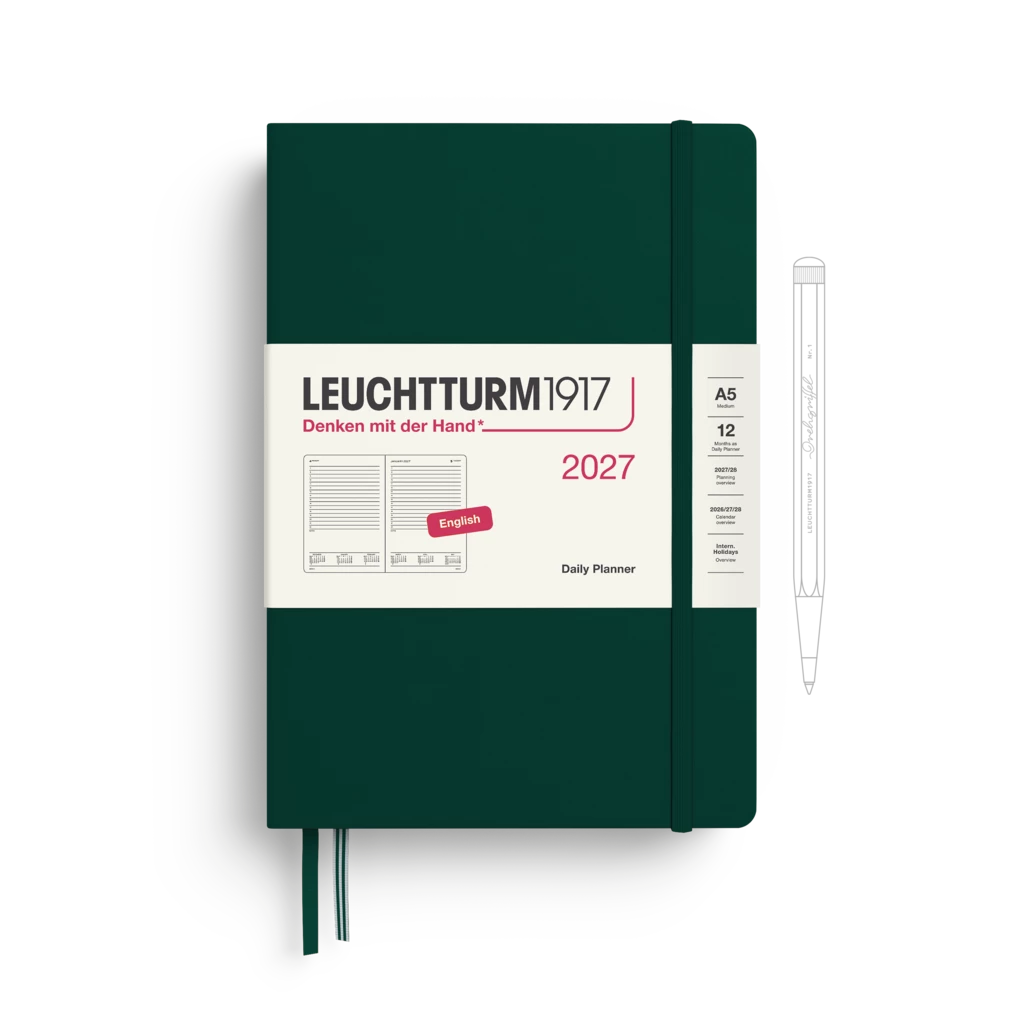 Leuchtturm1917 2027 daily planner in dark forest green with a white paper band around the middle, shown on a white background with a pen outline to the right.