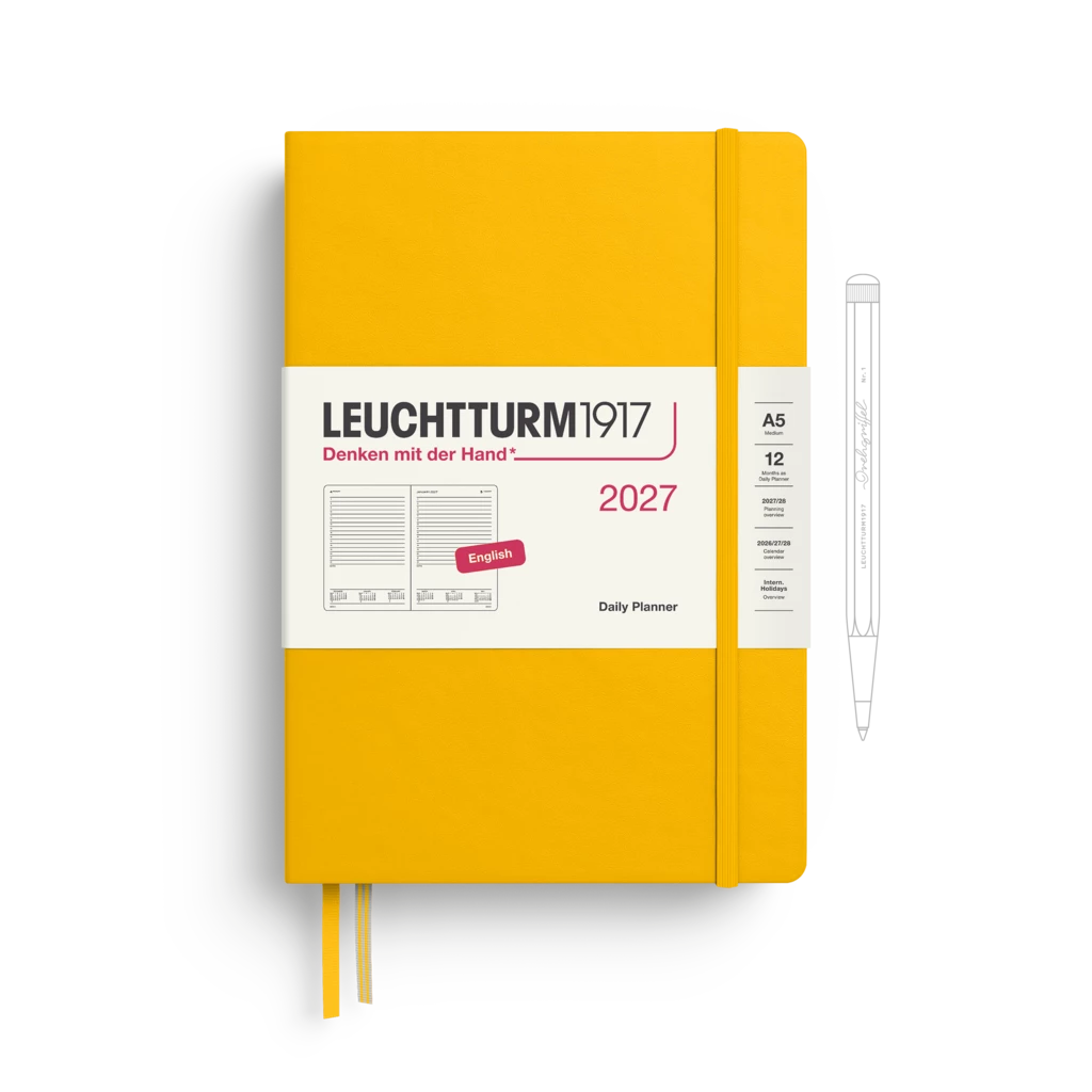 A Leuchtturm1917 2027 daily planner in a bright yellow hardcover, shown closed with a white paper band around the middle and two yellow ribbon bookmarks. A thin pen outline is visible to the right on a clean white background.
