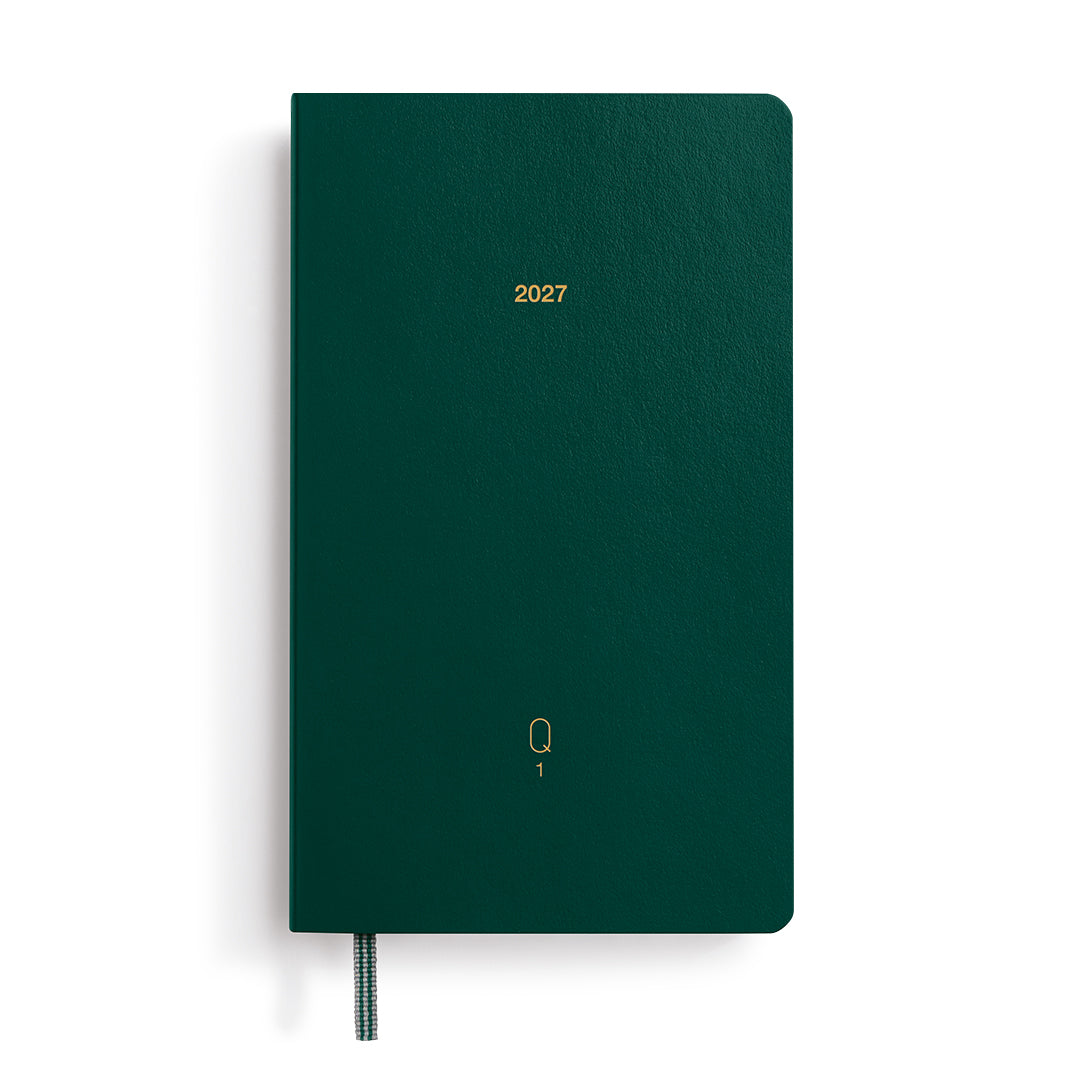 Green notebook with '2027' printed on it against a white background