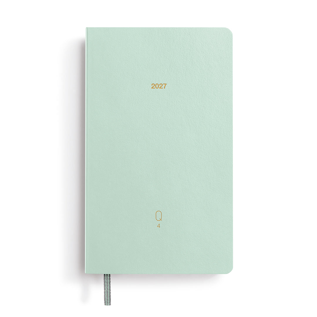 Mint green planner with '2027' printed on a white background