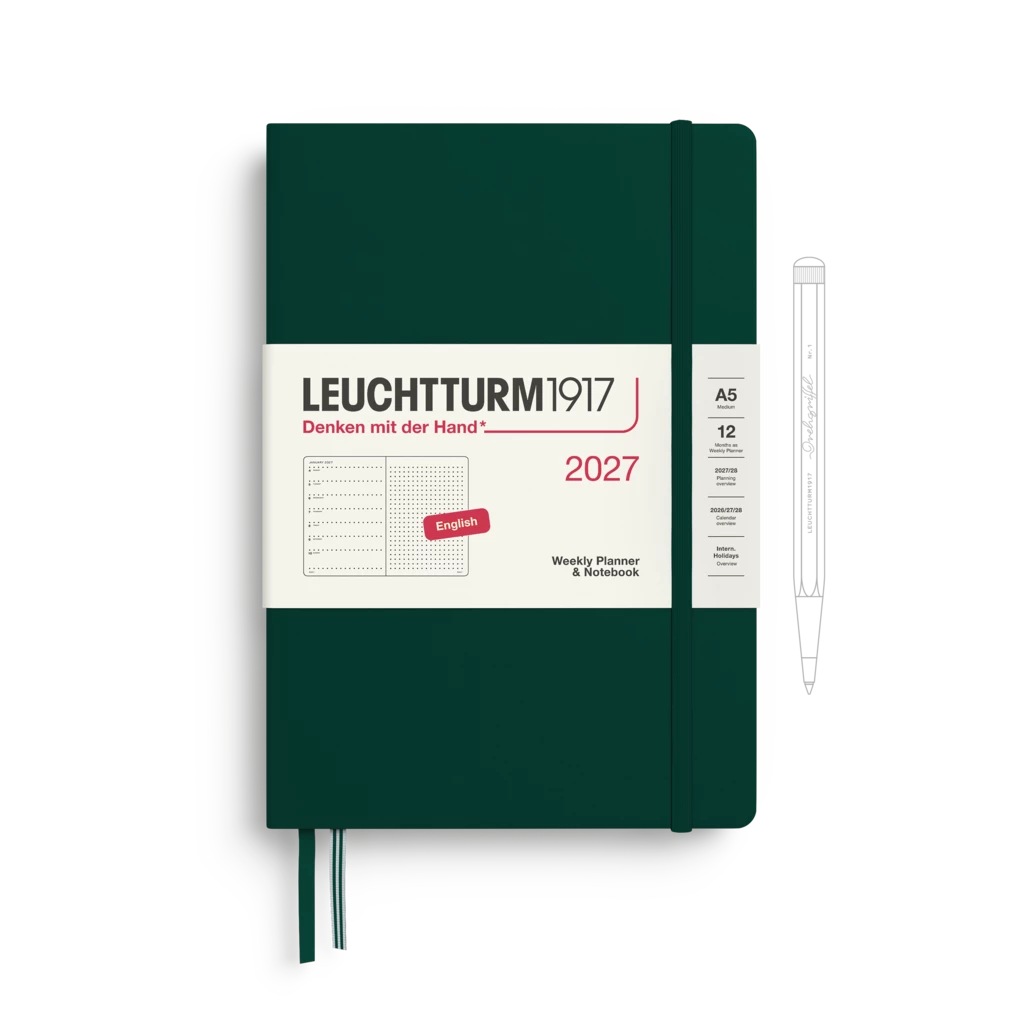 Leuchtturm1917 2027 weekly planner in dark forest green with a white paper band around the middle and a matching pen shown to the right, on a white background.