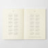 An open two-page calendar spread showing the years 2027 and 2028 in a minimalist black grid format on warm cream paper, photographed against a light gray background.