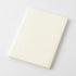 Beige square notebook on a white background