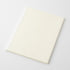 A blank cream-colored notebook or journal with a textured cover, shown at an angle on a light gray background.