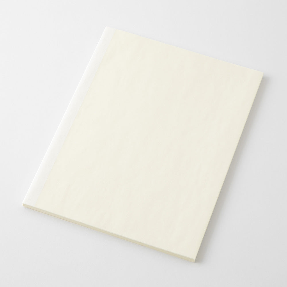 A blank cream-colored notebook or journal with a textured cover, shown at an angle on a light gray background.