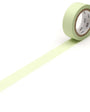 Roll of pastel leaf green tape on a white background