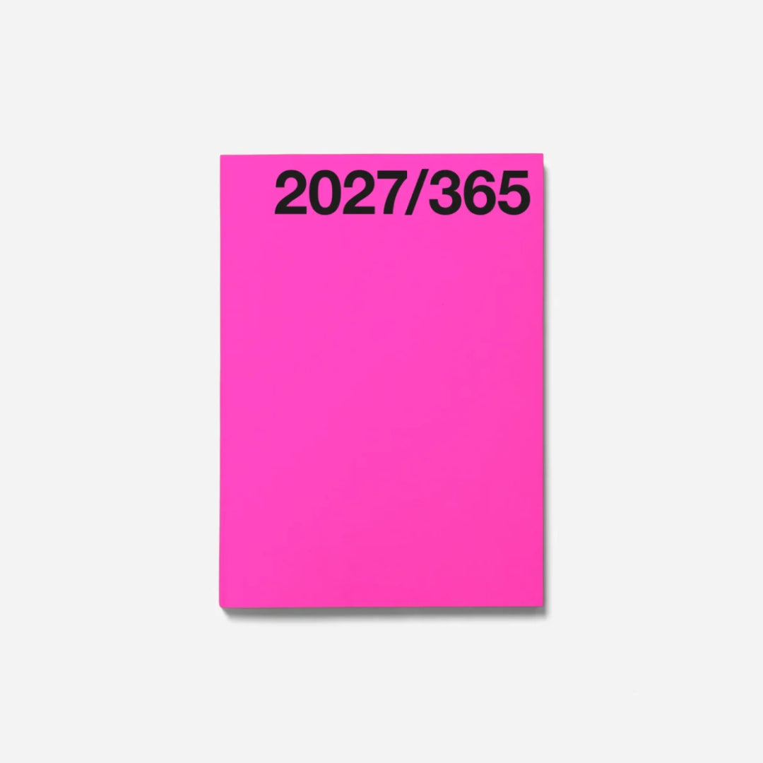 A bright pink sticky note pad with the black text '2027/365' printed at the top, shown on a light gray background.