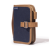 Navy pouch with brown strap and buckle on a white background