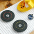 Two black circular objects with lettering on a white surface, one with a Penco logo.