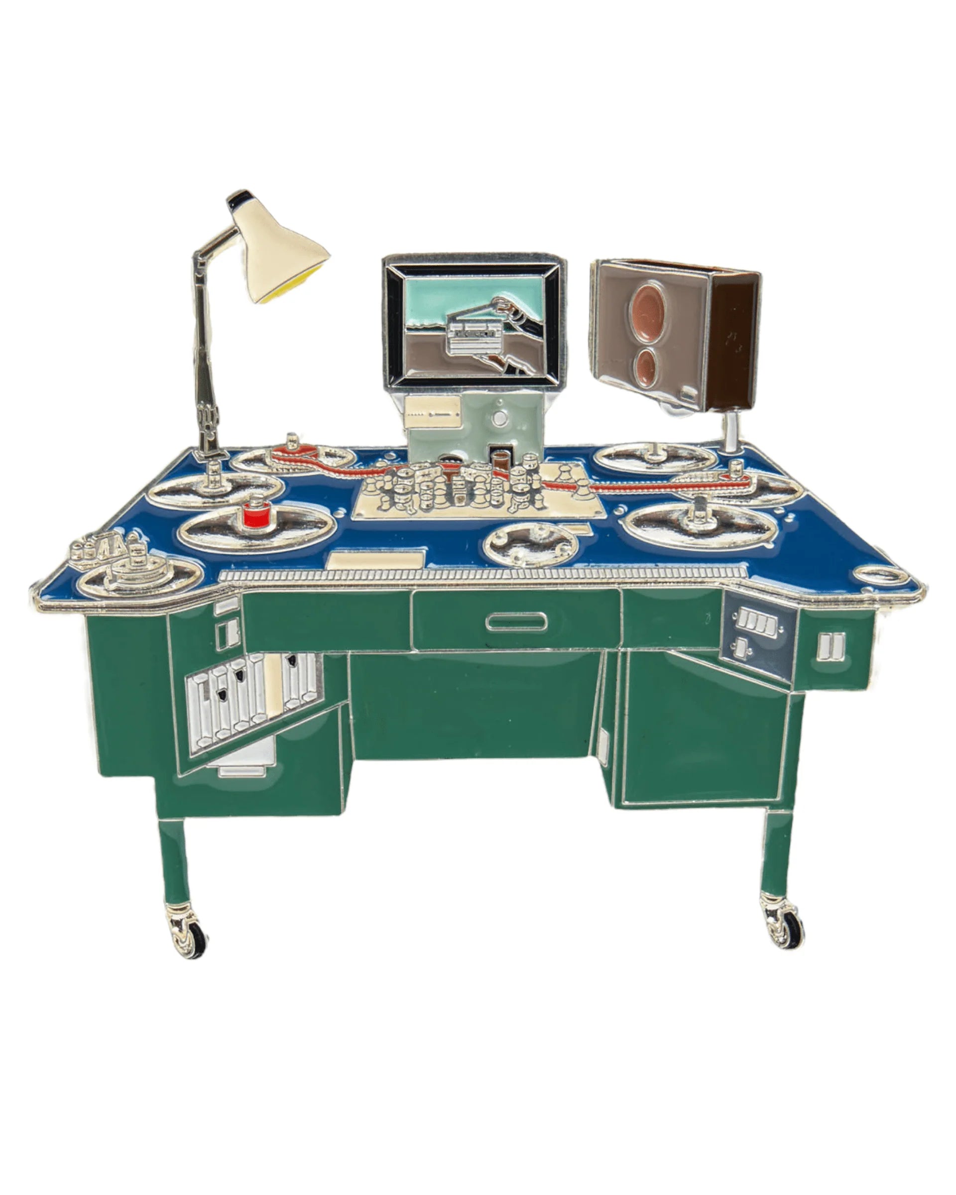 A vintage-style desk or control console with a blue top, green base, multiple circular dials, a small screen, a lamp, and a speaker, isolated on a white background.