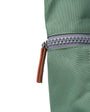 close up of zip frost coloured backpack on a white background