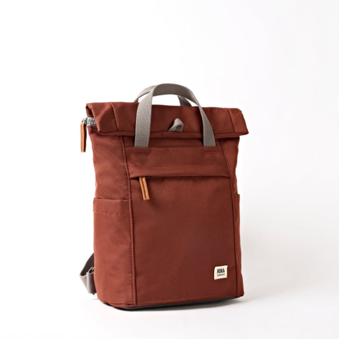 Brown backpack with gray straps on a white background