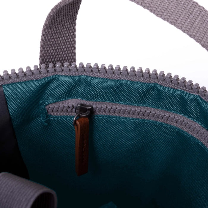interior of teal coloured backpack
