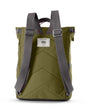 moss coloured backpack with grey straps in front of a white background