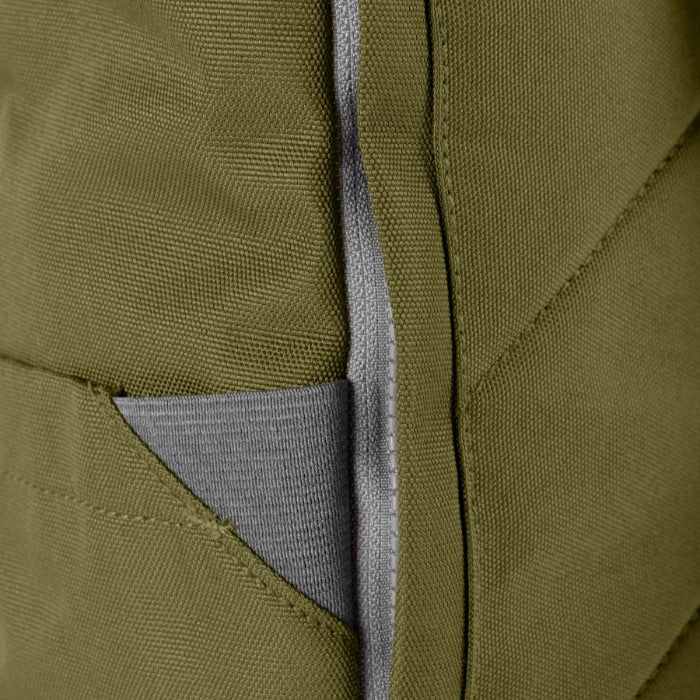 close up moss coloured backpack in front of a white background