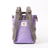 lavender coloured backpack on a white background with grey straps showing