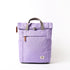 lavender coloured backpack on a white background