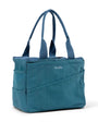 Blue tote bag with 'Socca' branding on a white background