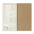 Traveler's notebook departure card on a white background