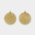 Two gold travel-themed pendants on a white background