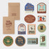 Collection of travel-themed stickers and notebook on a white background